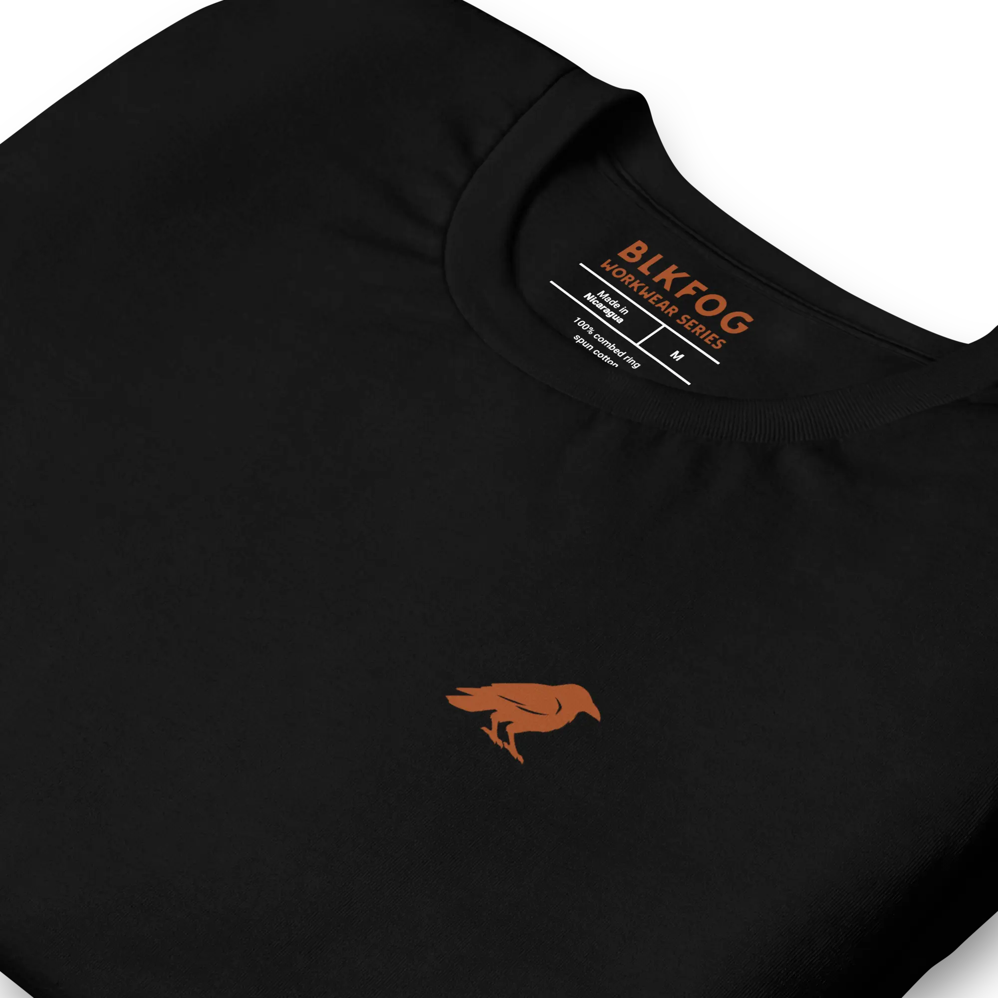 blkfog-long-shifts-tee-folded-rust-crow Folded BLKFOG Long Shifts black workwear t-shirt with rust crow badge graphic visible